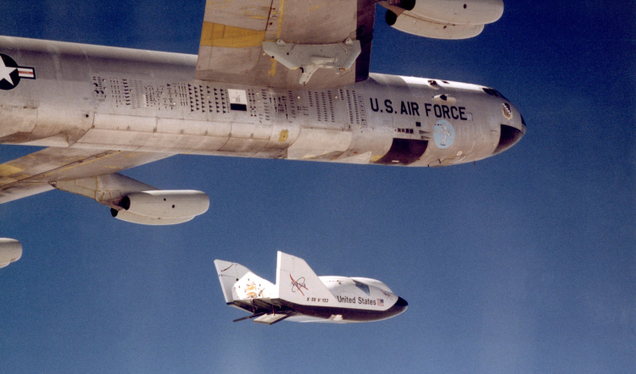 Balls 8 drops the NASA X-38 over the Dryden Flight Research Center in California. Note the mission markings on the fuselage, listing every test flight going back to the X-15 (NASA)